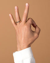 Gold 5mm Half Round Band on male model.