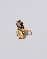 View from the side of the Illusion of Opposites Ring on light color background.