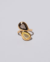 Illusion of Opposites Ring on light color background.