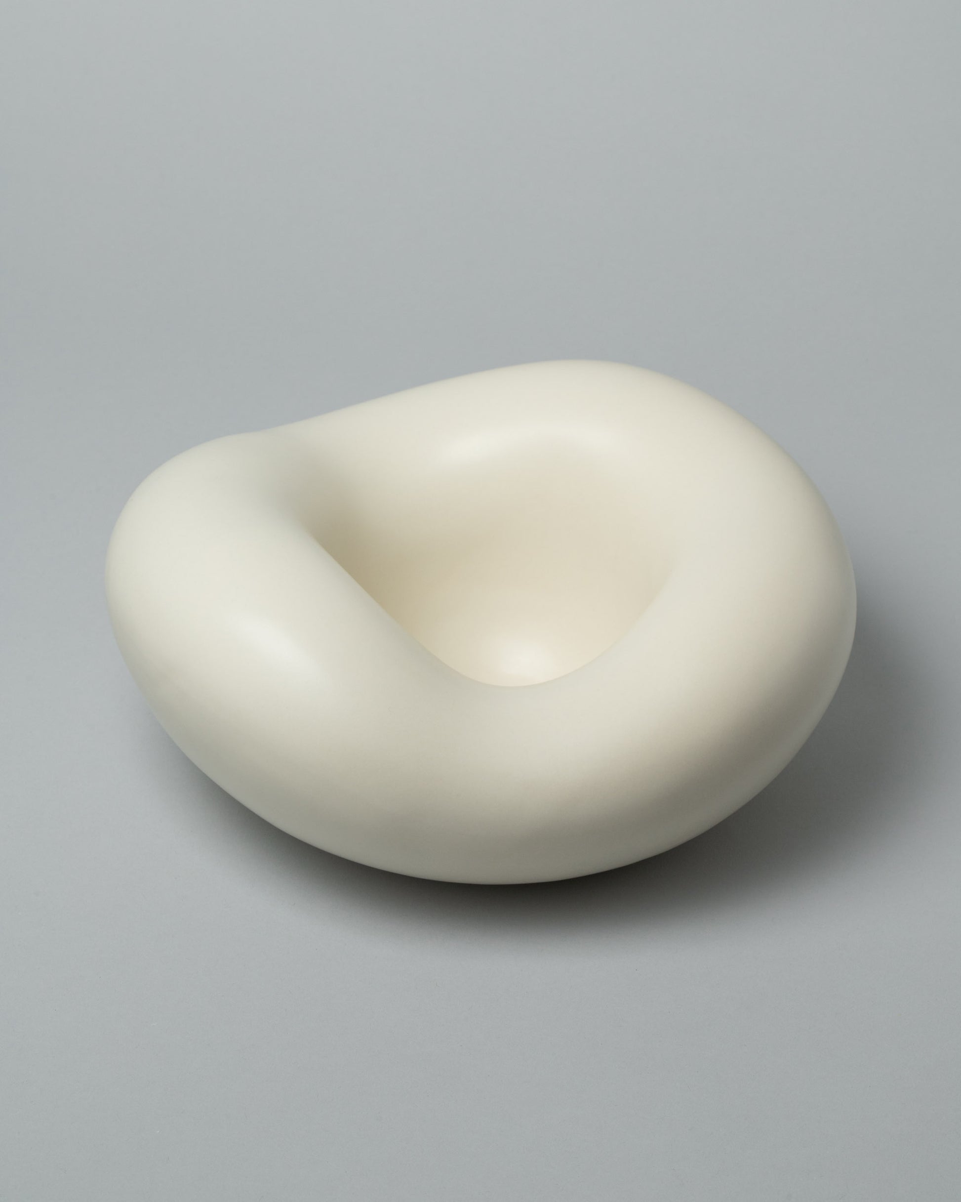 Dust and Form Unda Form on light colored background.