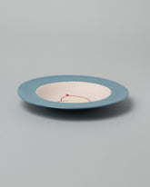 Laetitia Rouget Peachy Dinner Plate on light color background.