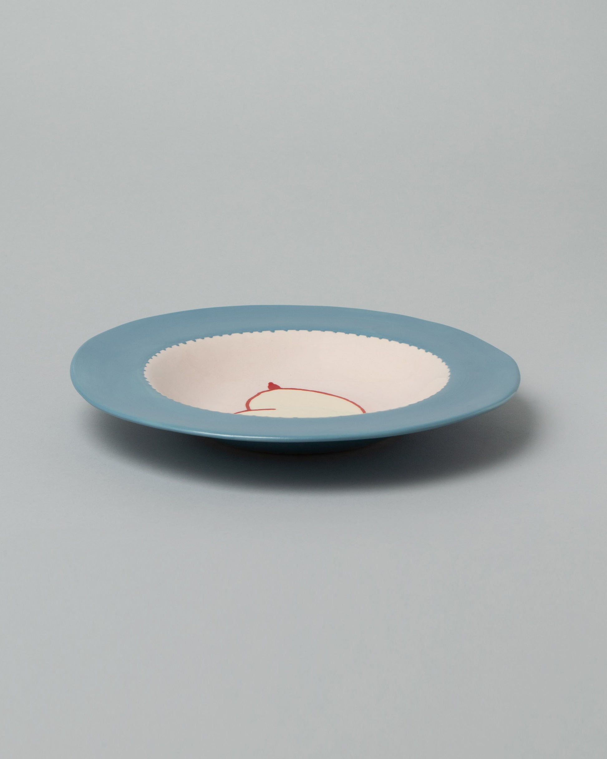 Laetitia Rouget Peachy Dinner Plate on light color background.