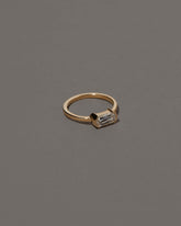View from the side of the Conviviality Ring on grey color background.