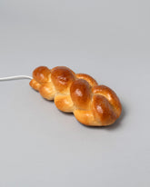 Pampshade Challah Lamp on light color background.