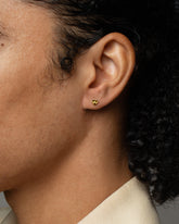 Lotus Blossom Stud Earring Single on model.