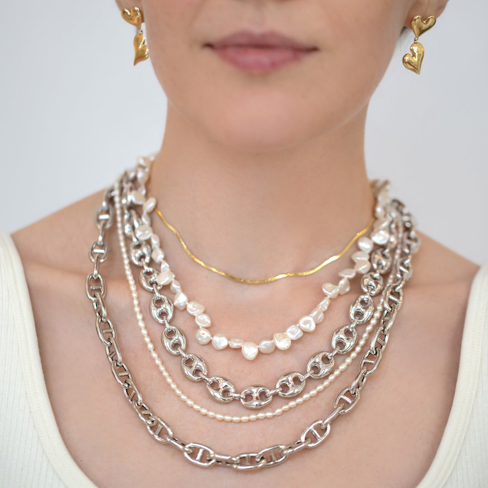 product_details::Silver Puffed Mariner Chain on model.