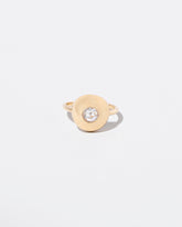 Petite Exposition Ring on light color background.