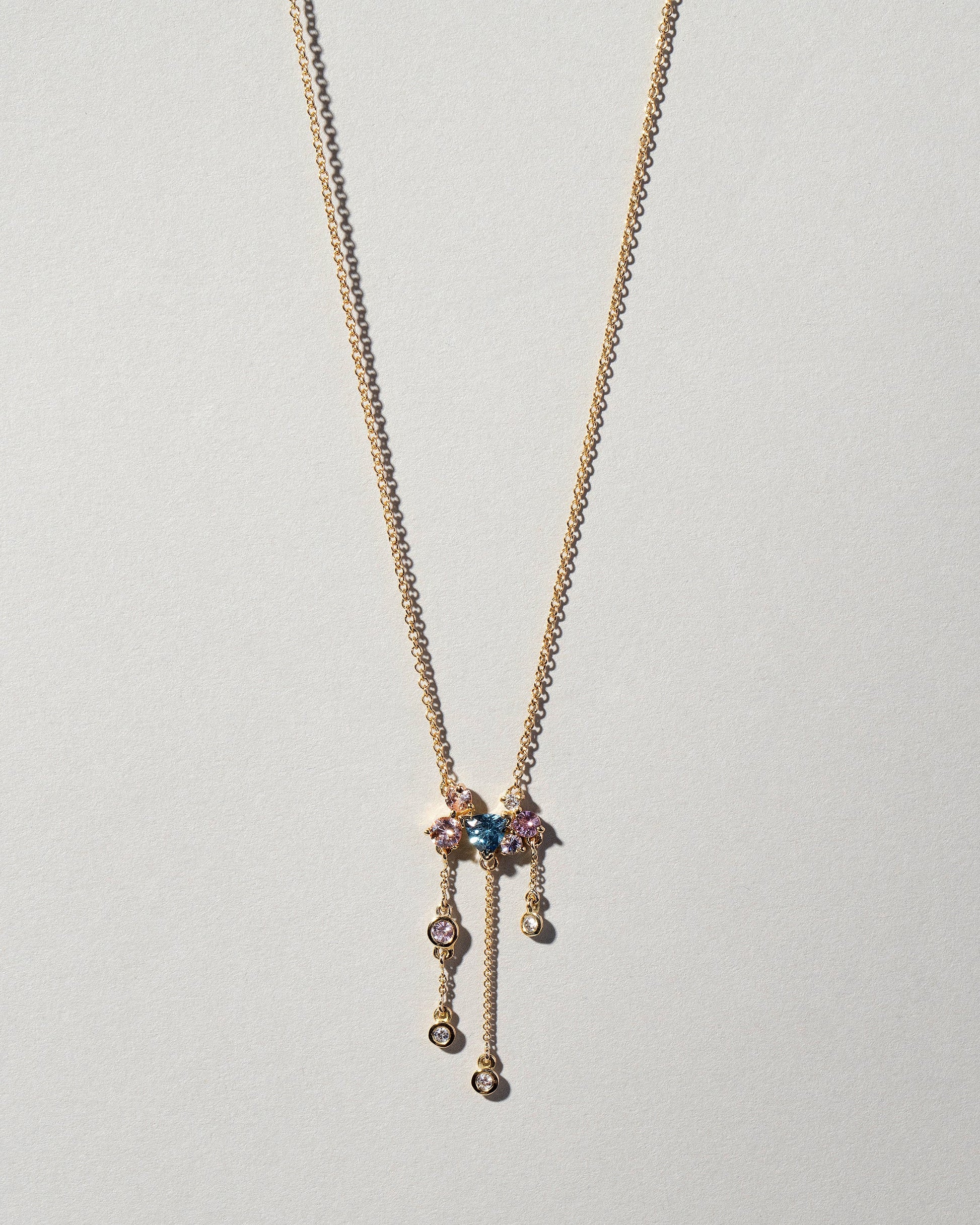 Persephone Necklace on light color background.