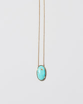 Turquoise Necklace on light color background.