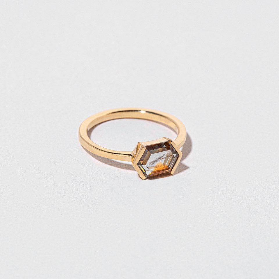 product_details::Closeup details of the Amber Ring on light color background.