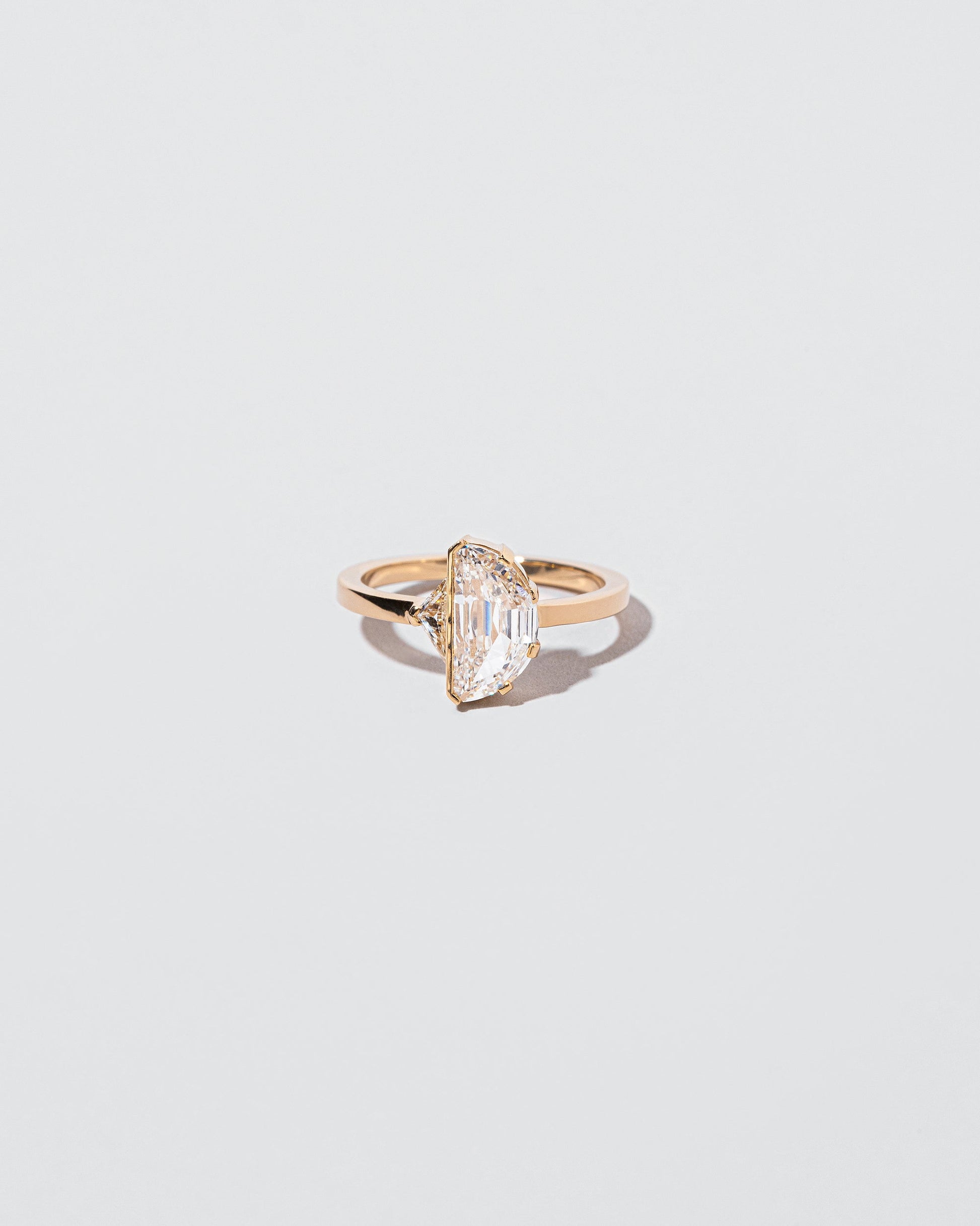High & Low Ring on light color background.