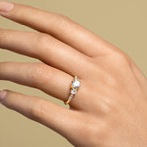 product_details::Past version of the White Diamond Orion Ring on model.