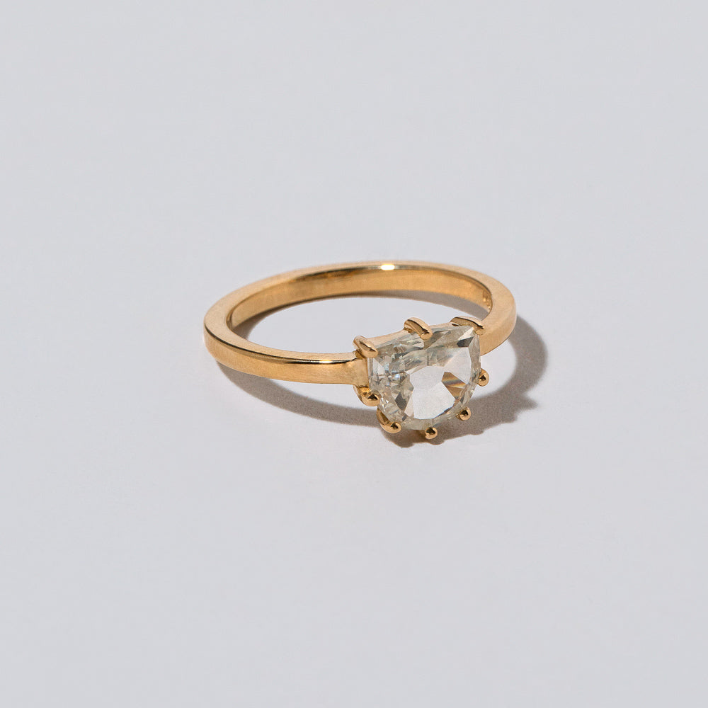 product_details::Closeup details of the Coupé Ring on light color background.