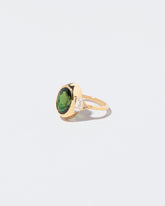 Symbolic Womb Ring on light color background.