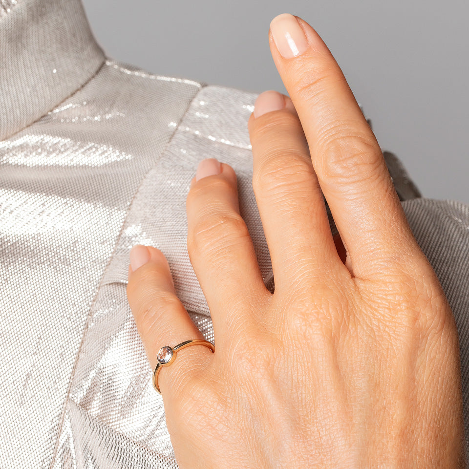 product_details::Rose Cut Purple Diamond Ring on model.