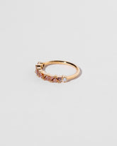 Eleven Trillion Ring - Peach Sapphire on light color background.