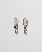 Luster Earrings on light color background.