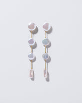 Antaeus Earrings on light color background.