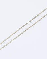 Oval Chain Necklace on light color background.