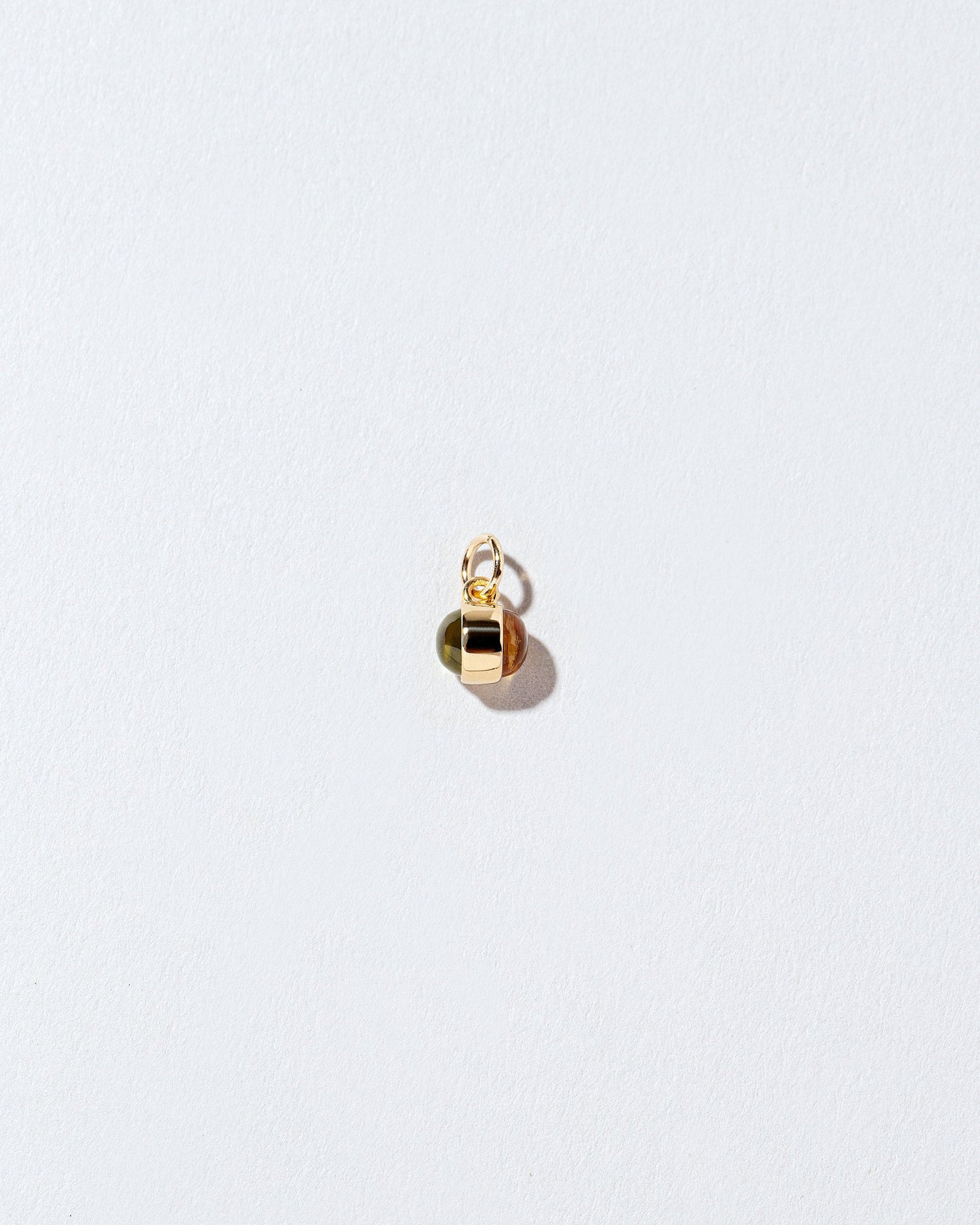 Birthstone Charm on light color background.