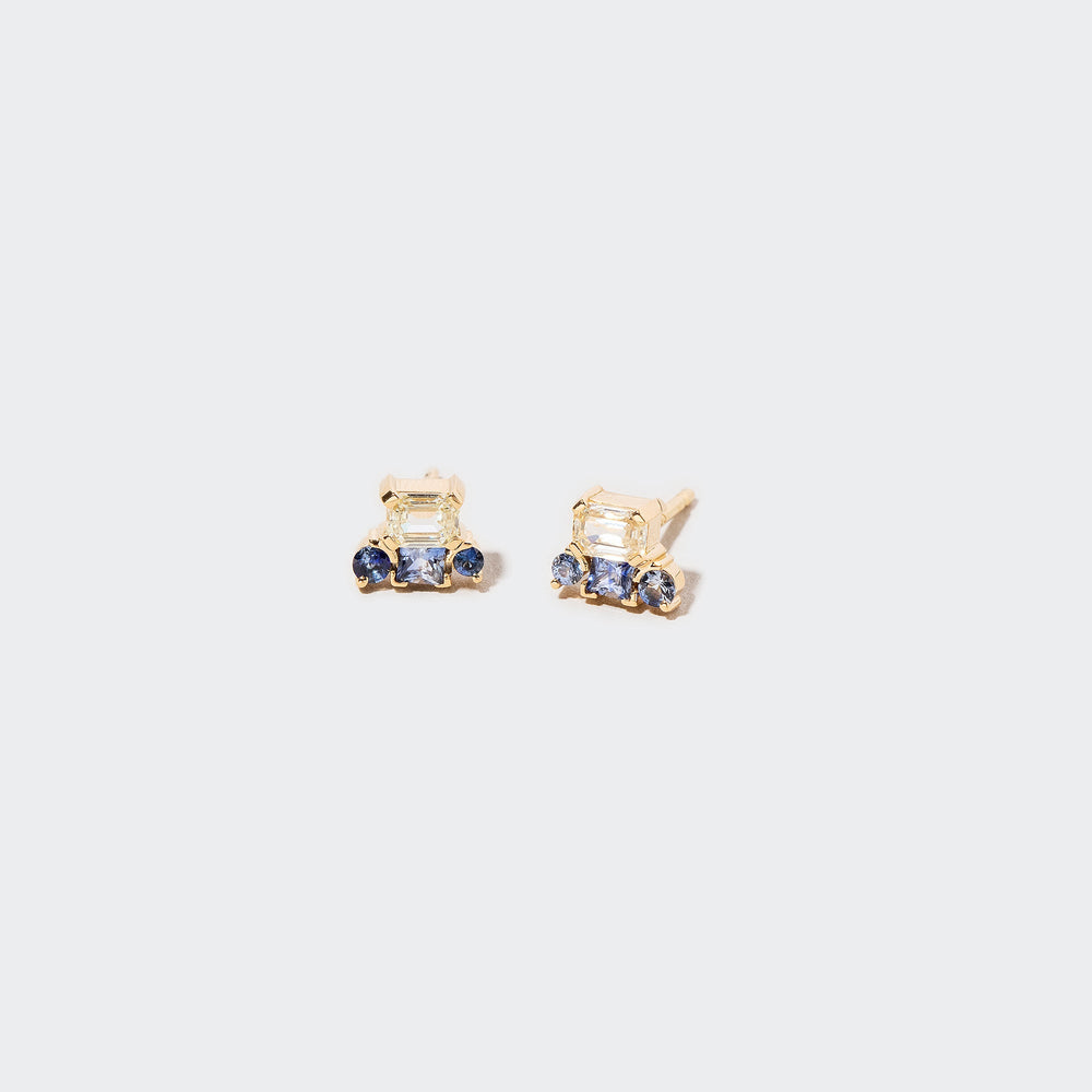 product_details::Closeup details of the Linear Stud Earrings on light color background.