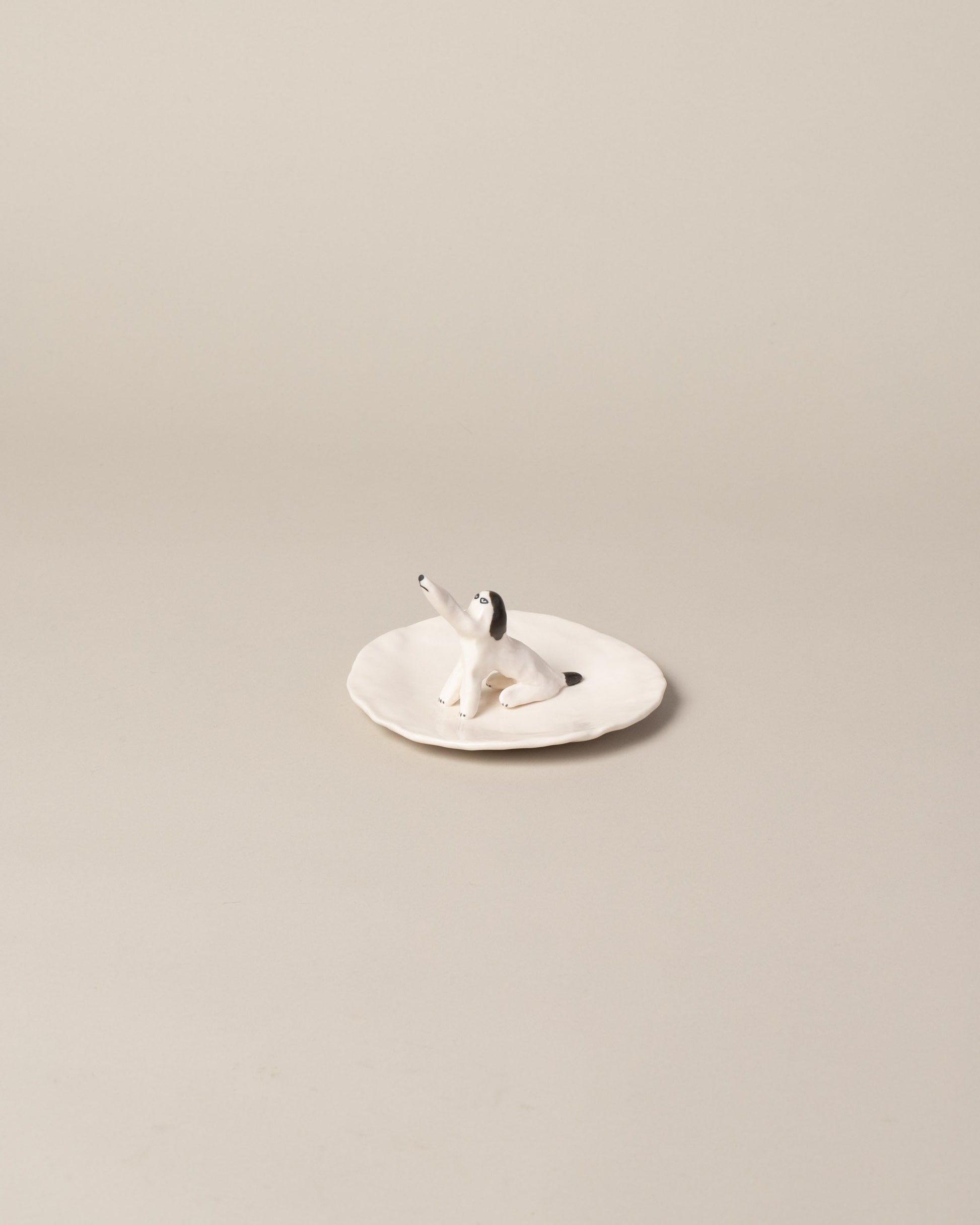 Eleonor Boström Dog Ring Dish on light color background.
