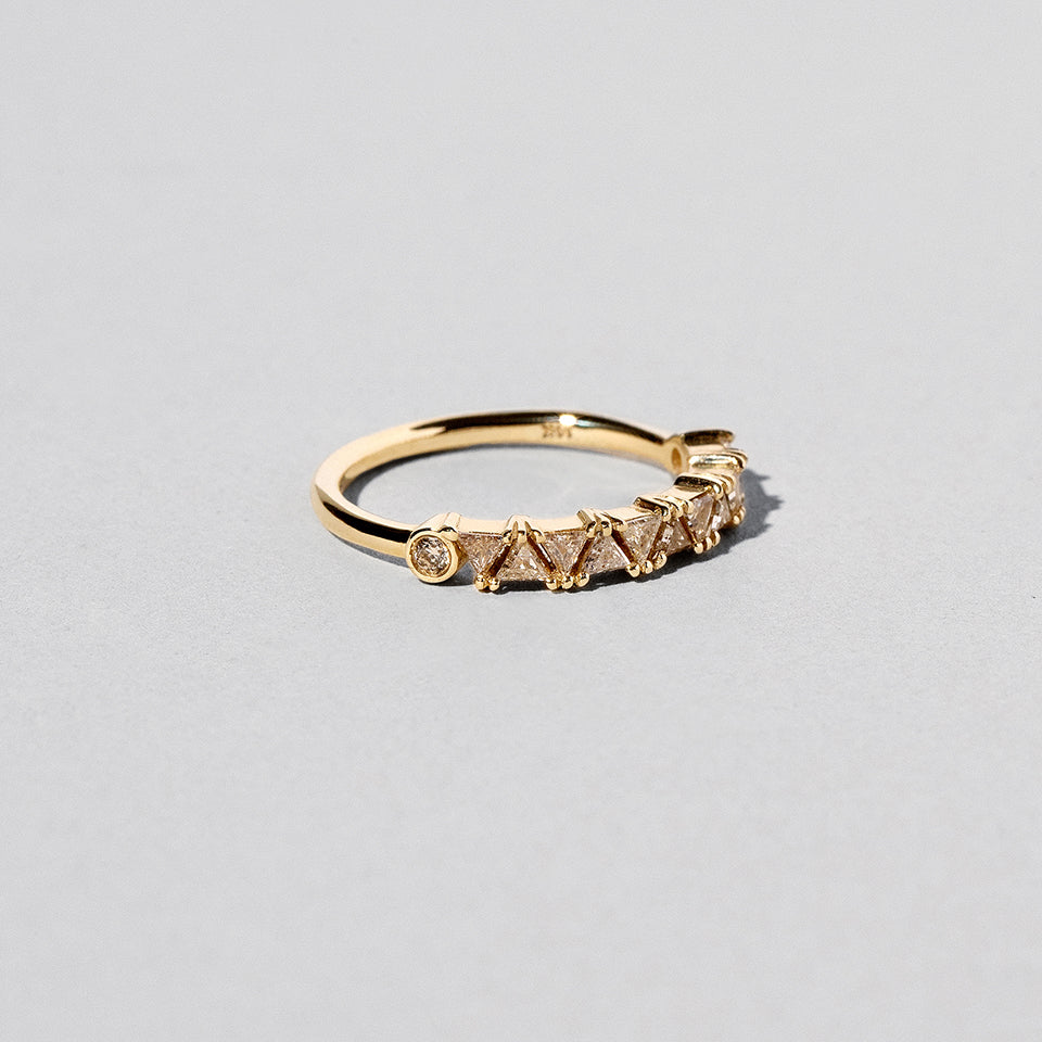 product_details:: Eleven Trillion Ring - Champagne Diamond on light color background.