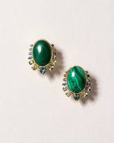 Malachite & Sapphire Earrings on light color background.