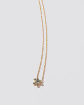 Apposition Necklace on light color background.