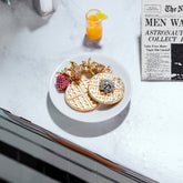 product_details::Styled image featuring the Ruby Pavé Strawberry Charm, Strawberry Charm, Waffle Charm and Waffle With Whipped Cream Charm.