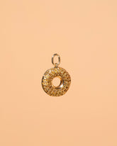 Lemon Donut Charm on light color background.