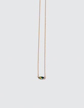 Product photo of Fin Necklace on a light color background