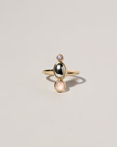 Elsa Ring on light color background.