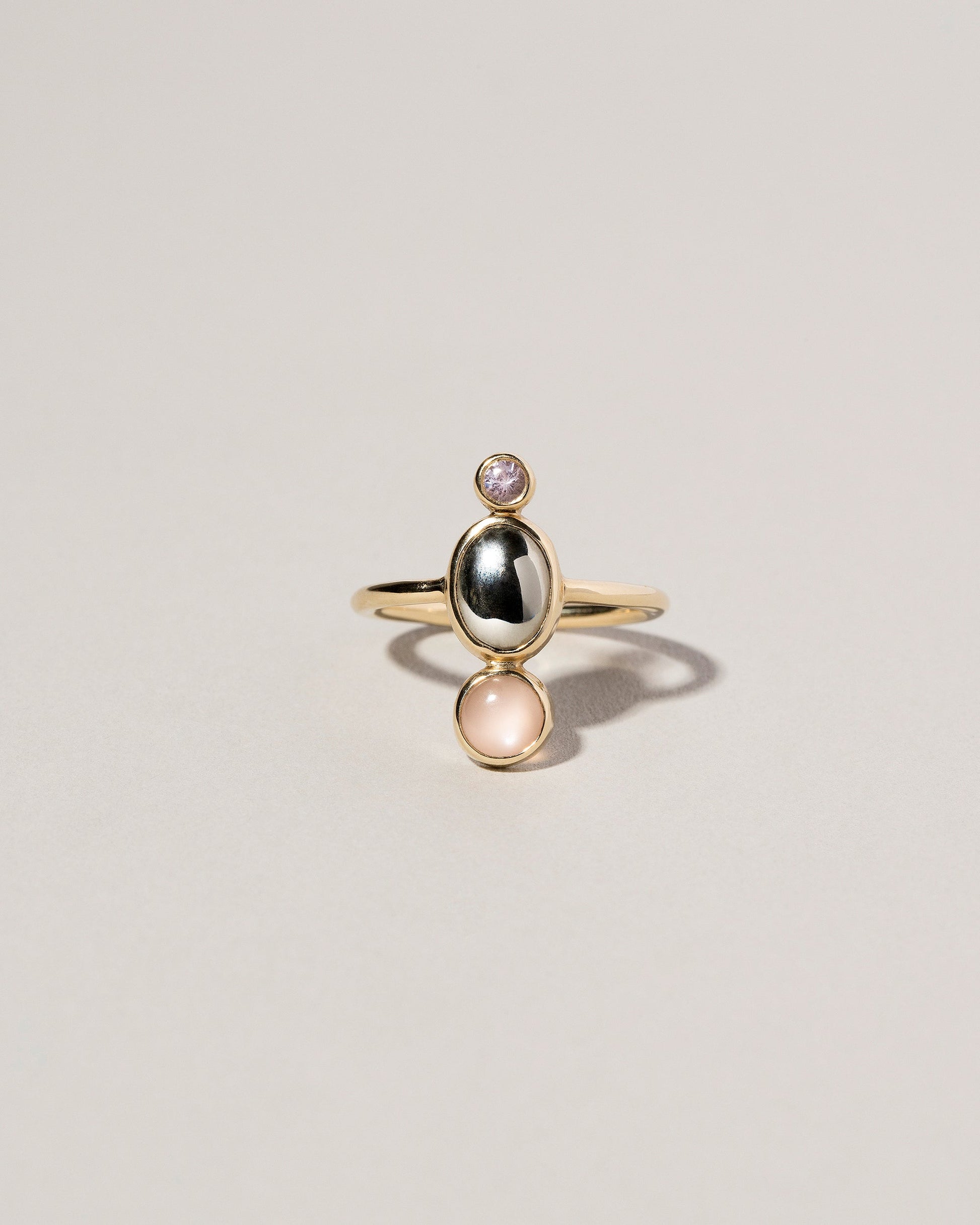 Elsa Ring on light color background.