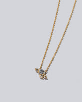 Cosmic Dawn Necklace - White Diamonds on light color background.