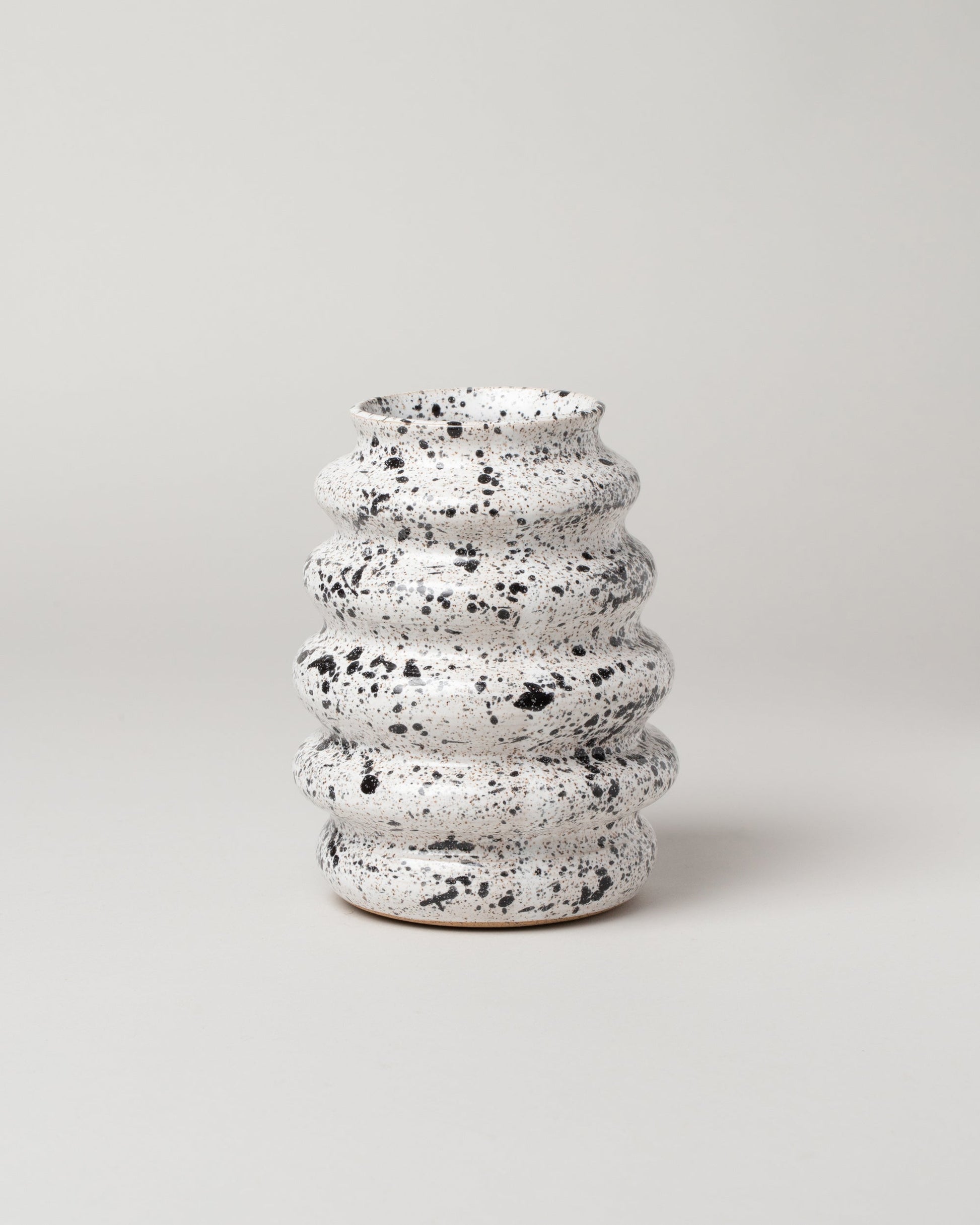 Recreation Center Black Wavy Vase on light background