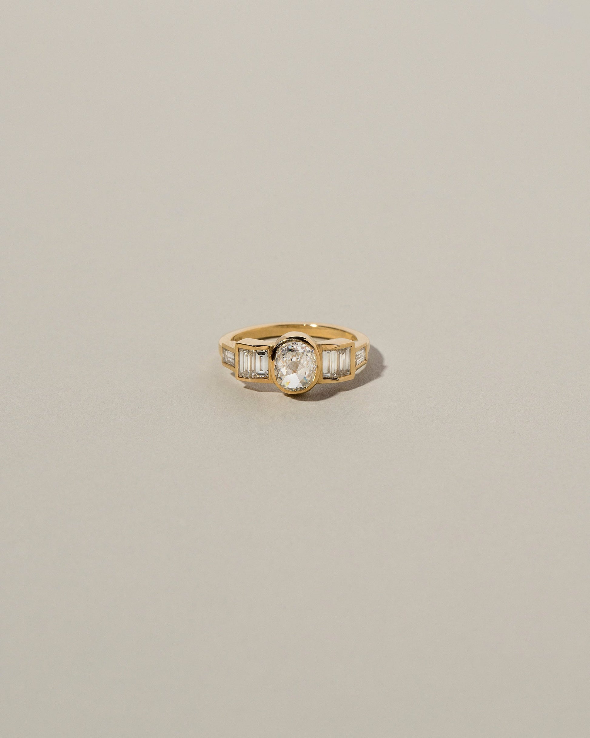 Modified Brilliant Diamond Ring on light color background.