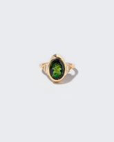 Symbolic Womb Ring on light color background.