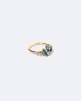 Luna Ring - Bicolor Sapphire on light color background.