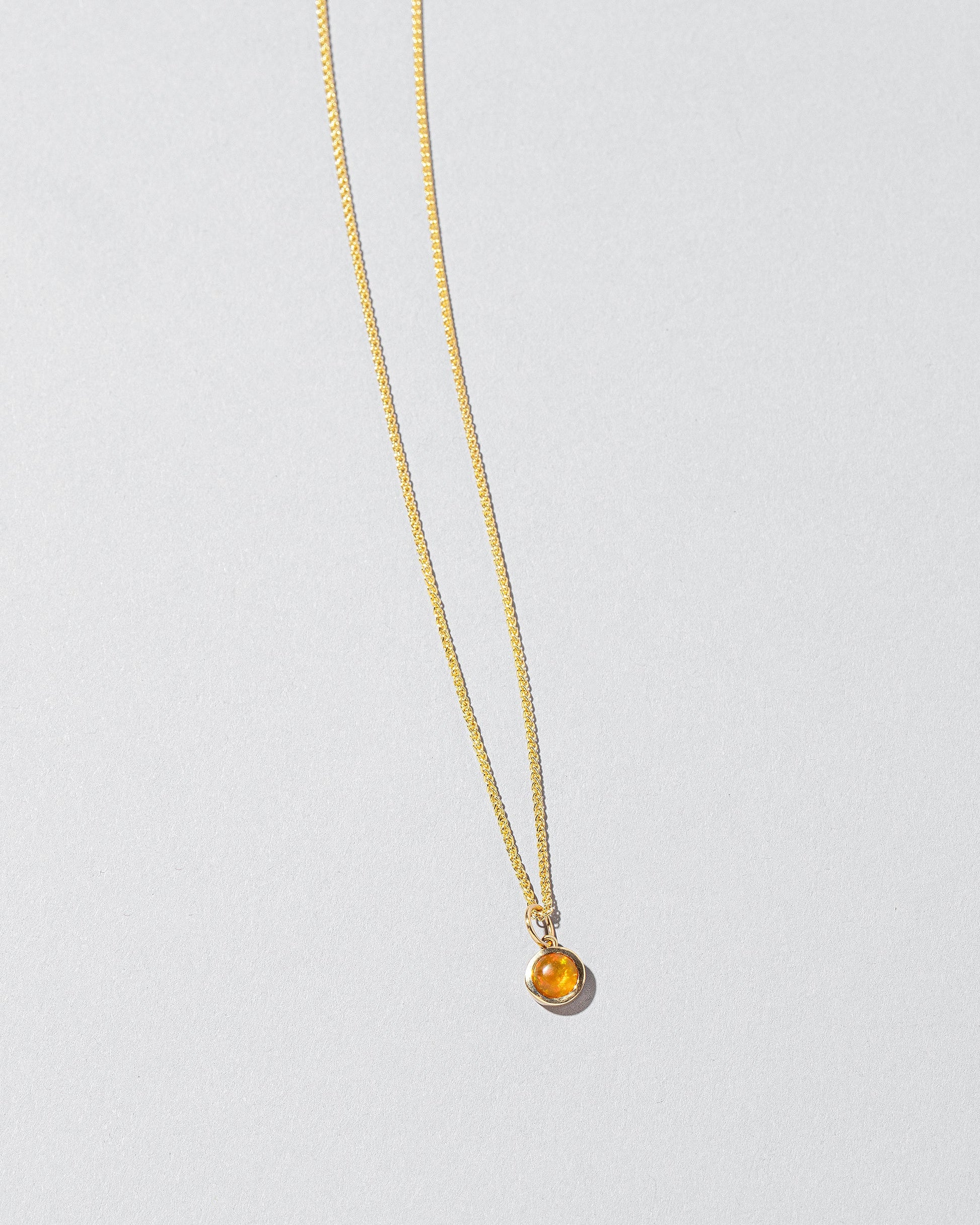 Mars Pendant on light color background.