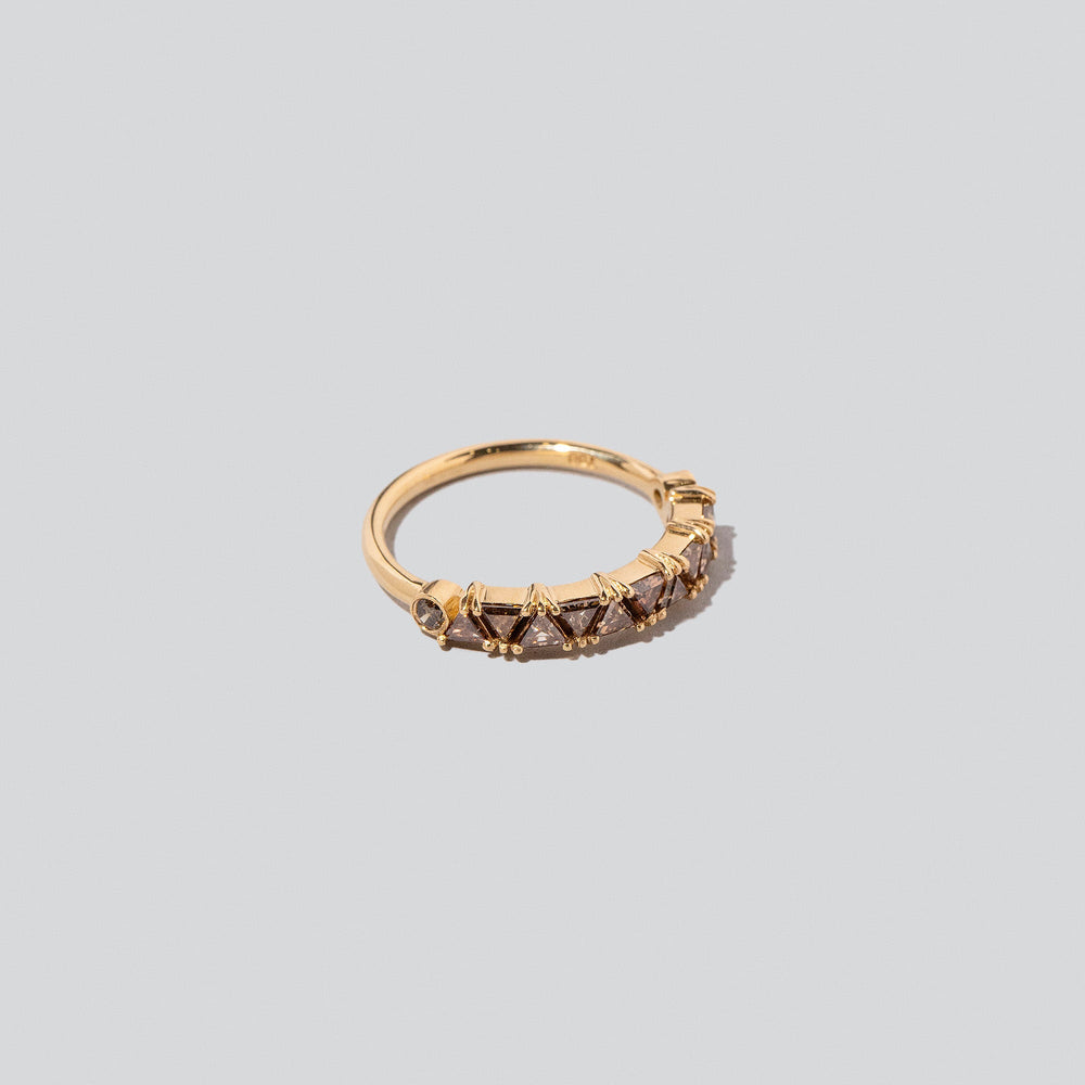 product_details:: Eleven Trillion Ring - Cognac Diamonds on light color background.
