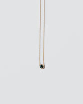 Triadic Necklace on light color background.