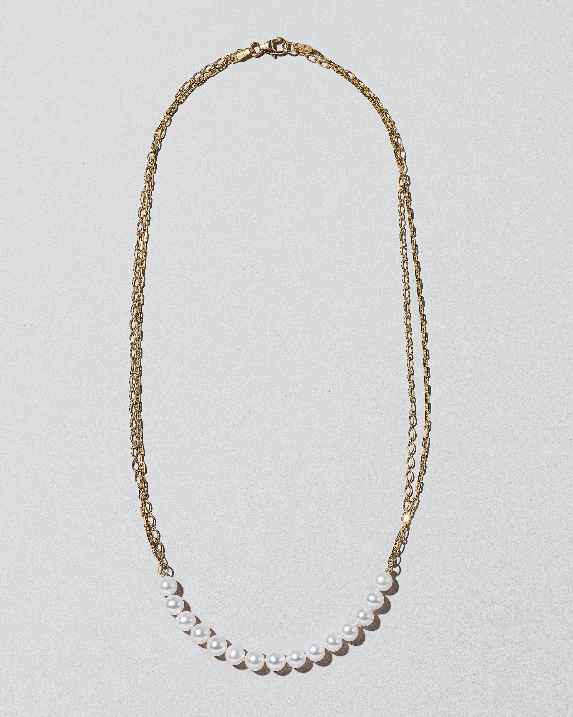 Pearls of Wisdom Necklace on light color background.