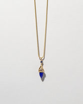 Lapis Drop Pendant on light color background.