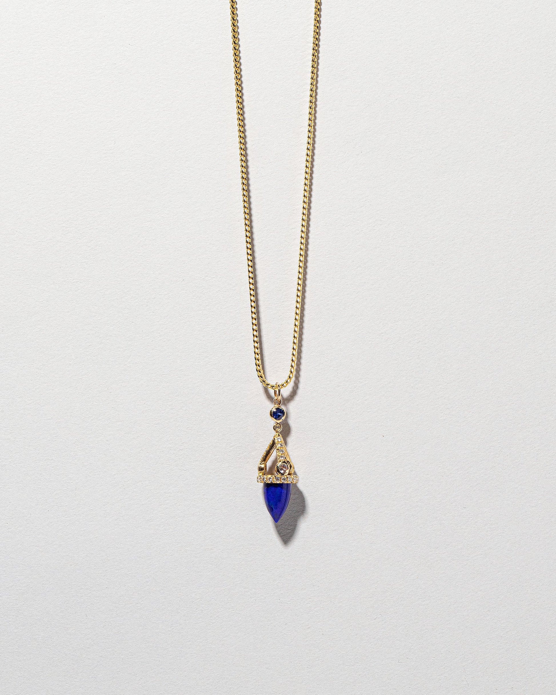 Lapis Drop Pendant on light color background.