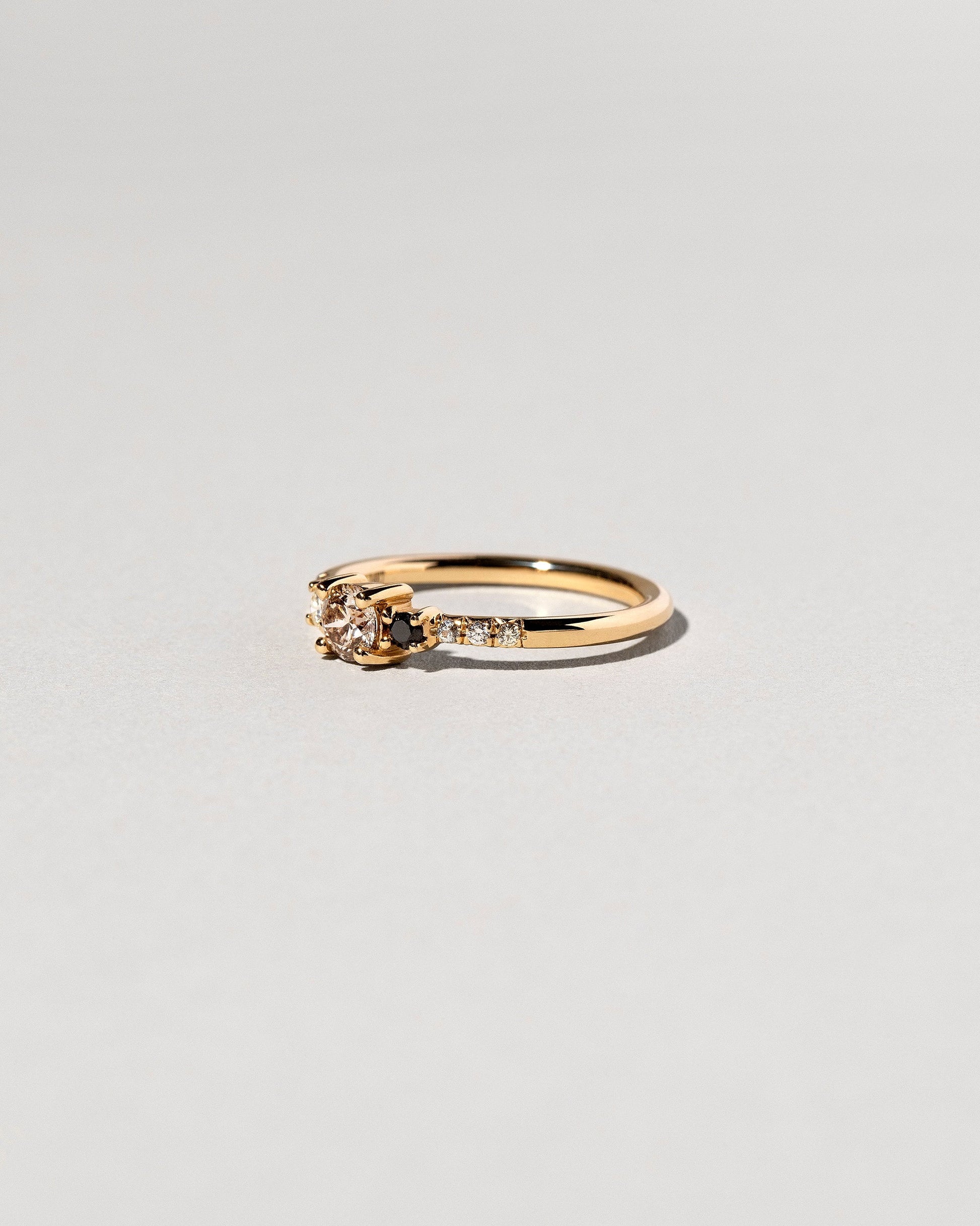 Patira Ring - Champagne Diamond on light color background.