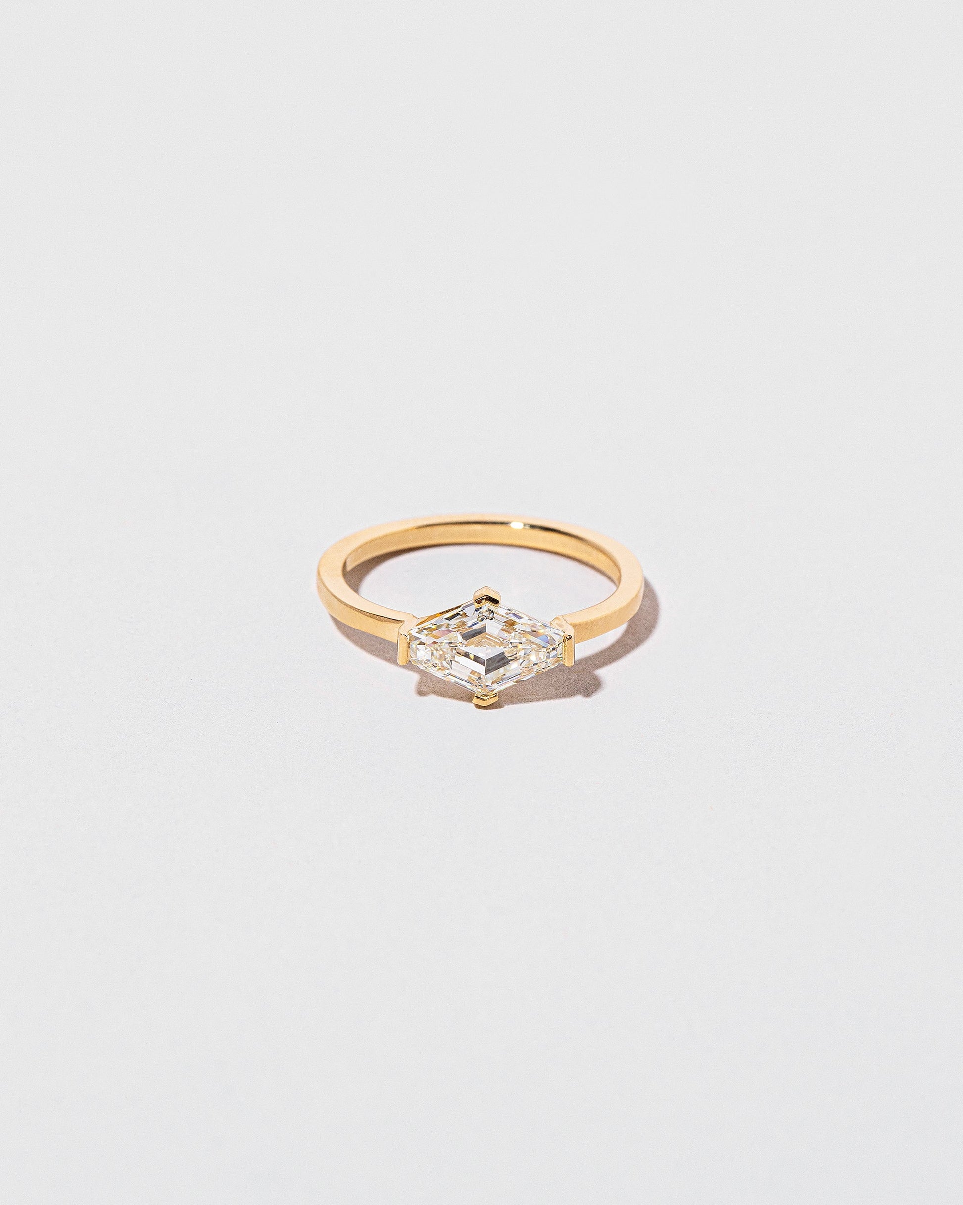 Divine Geometry Ring on light color background.