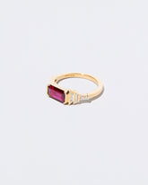 View from the side of the Femme Volage Ring on light color background.