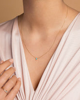 Gold Turquoise Triangle Necklace on model.