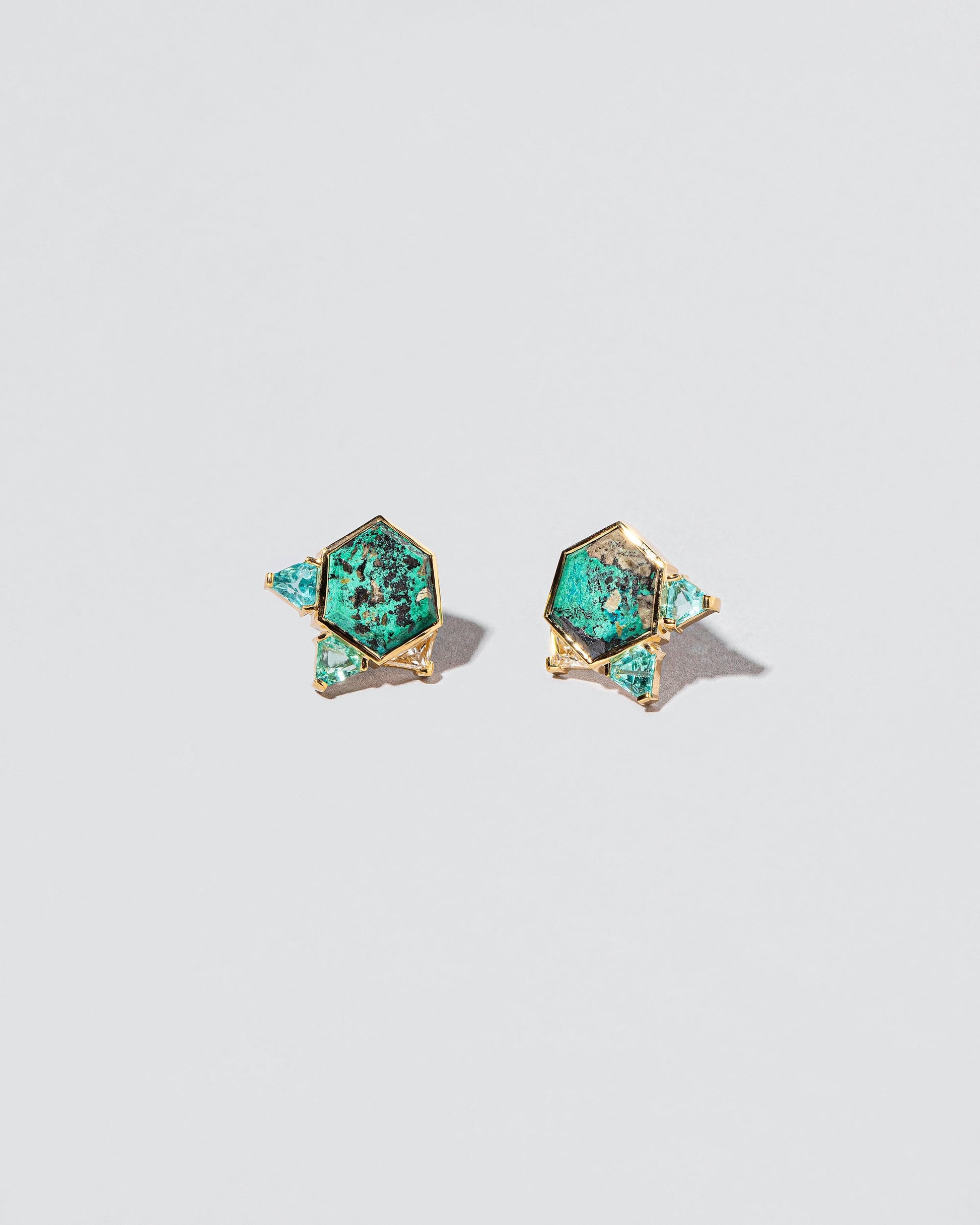 Azure Earrings on light color background.